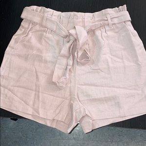 Mauve High waisted shorts with pockets. Size large